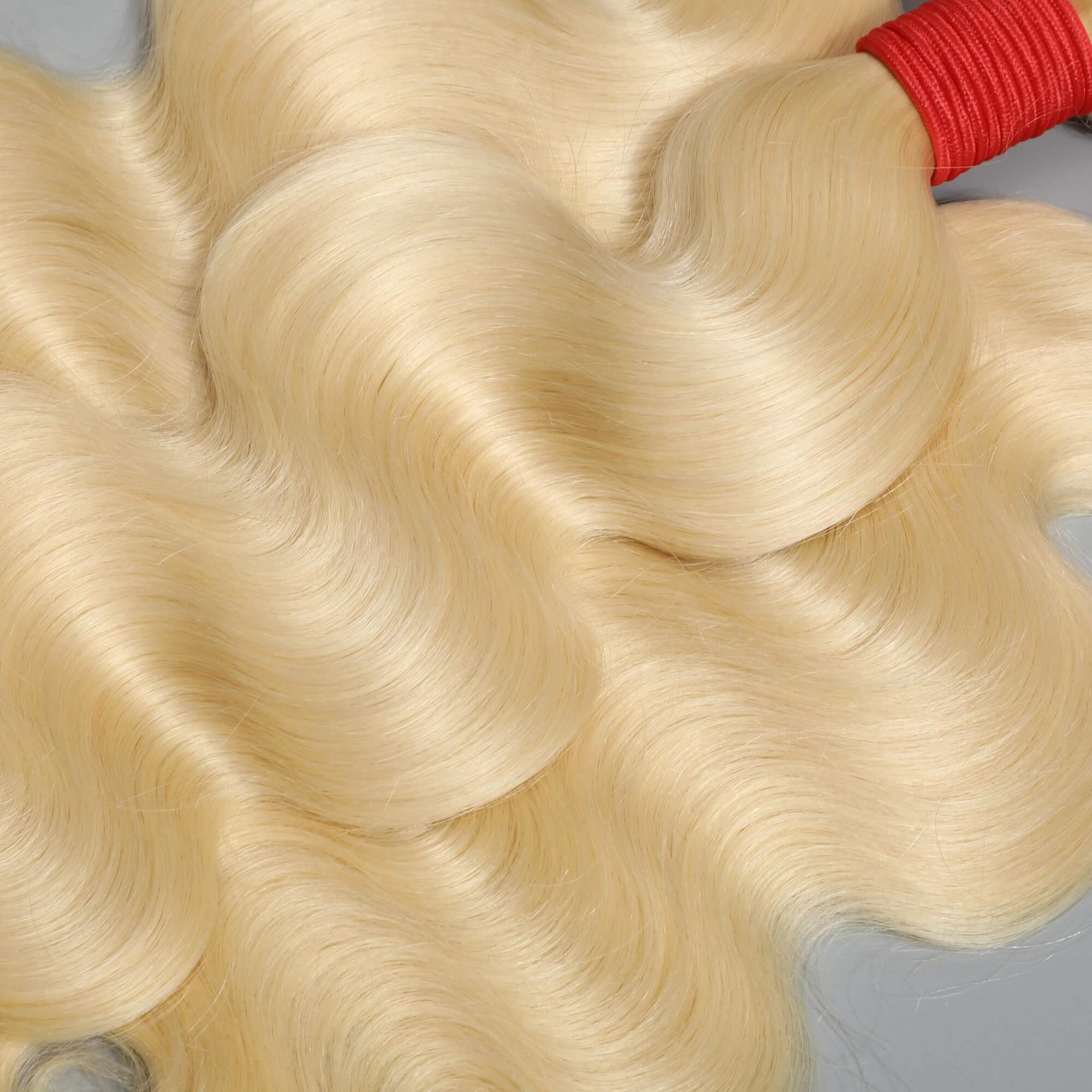 613 blonde body wave human hair 3 bundles 4